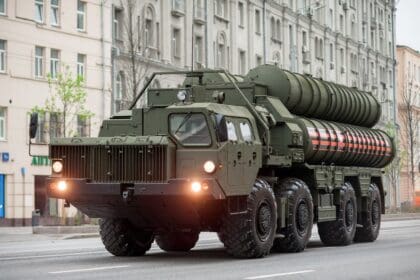 Russian S-400 Triumf launcher truck with headlights on, carrying its missile tubes in the travel position on a Moscow street