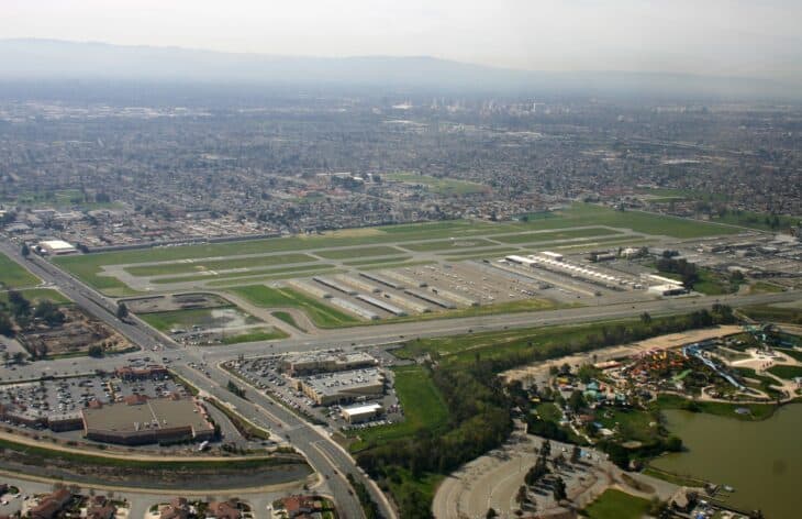Aerial view of Reid-Hillview Airport's runways with East San Jose neighbourhoods and roads around the field