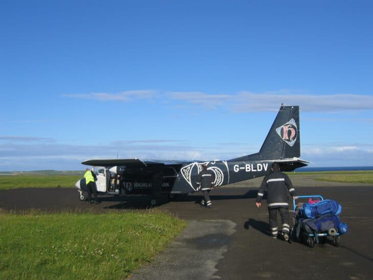 Britten-Norman Islander G-BLDV on the apron at Papa Westray as baggage is loaded