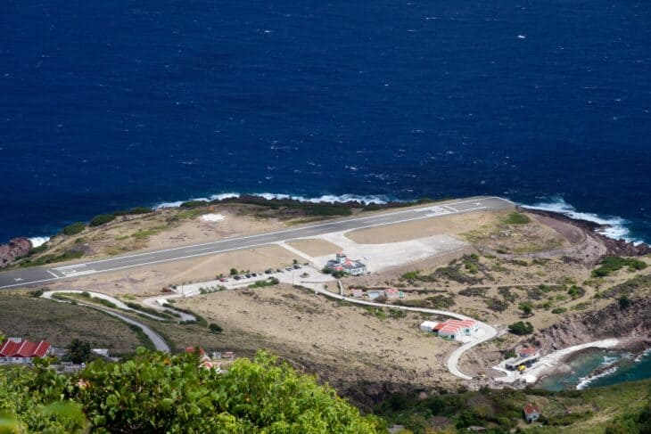 Aerial view of Saba's Juancho E. Yrausquin runway, a thin strip on a headland ringed by sea cliffs