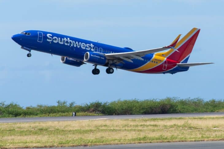 Southwest Airlines Boeing 737-800 N8329B rotating on takeoff in the current blue livery