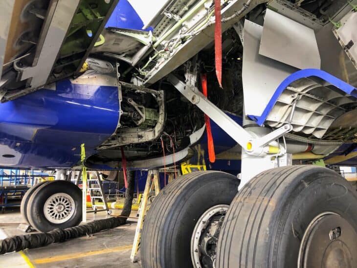 Main landing gear wheels and tires of a Southwest Airlines Boeing 737 in a maintenance hangar at Dallas Love Field
