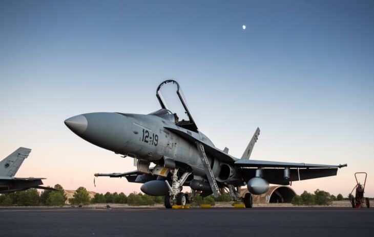 Spanish Air Force EF-18 Hornet C.15 parked at dusk with canopy raised