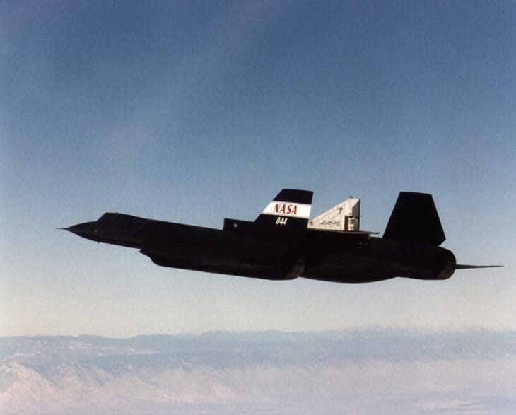 NASA 844 SR-71A in flight with the LASRE aerospike pod mounted on its upper fuselage