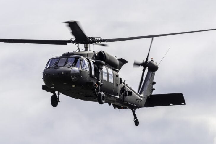 Swedish Air Force UH-60M Black Hawk in flight against an overcast sky