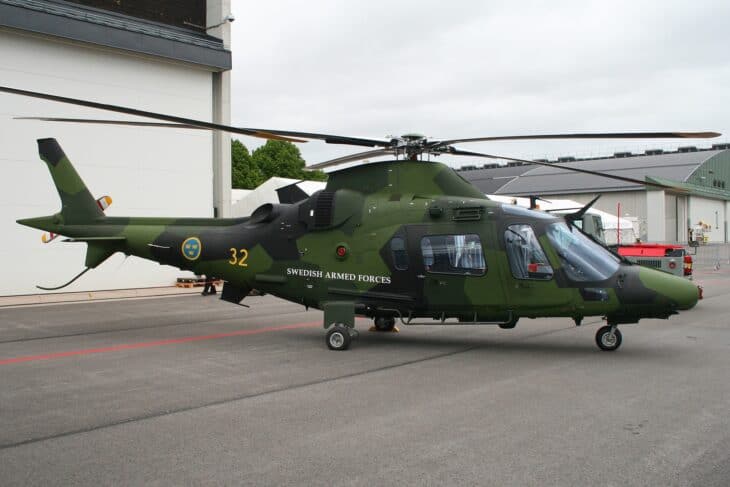 Swedish Armed Forces Agusta A109 Hkp 15A number 32 in green camouflage on the ramp