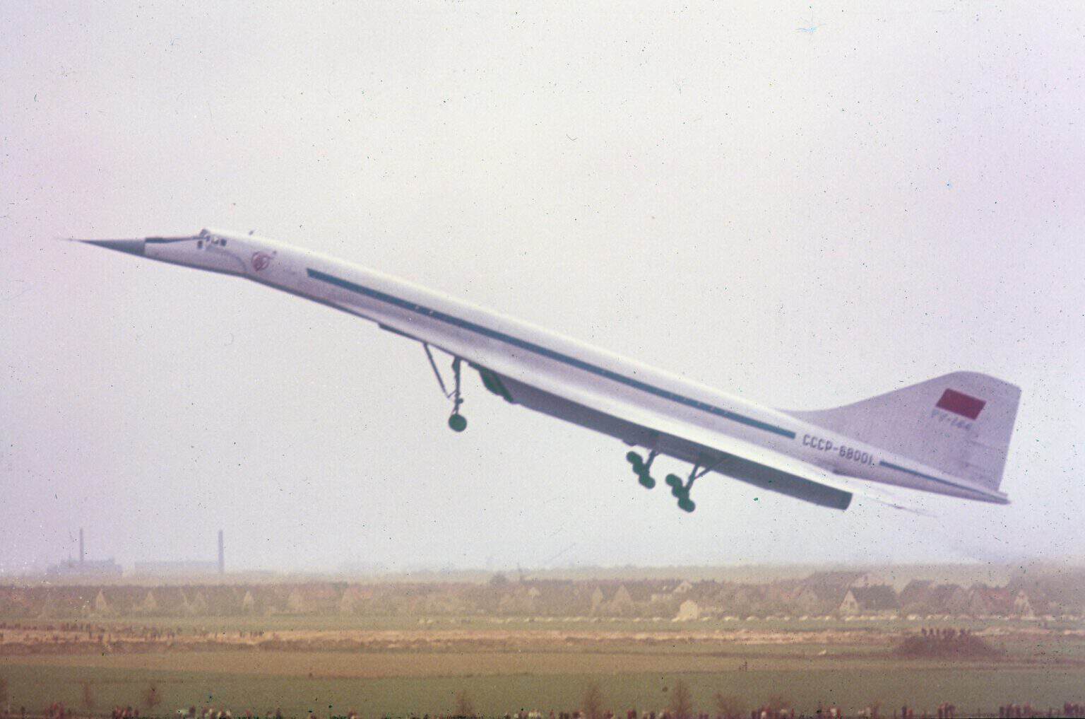 Aeroflot Tupolev Tu-144 CCCP-68001 climbing out after takeoff with its landing gear still extended, August 1971