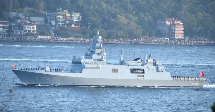 Turkish frigate TCG Istanbul (F-515) underway in the Bosphorus with crew on deck