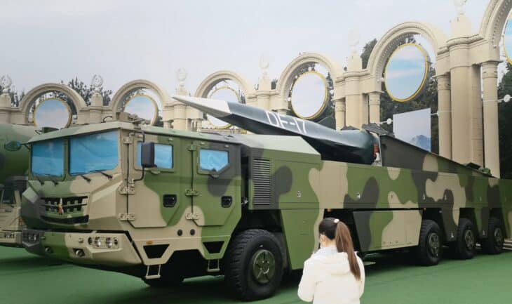 DF-17 hypersonic missile on its wheeled transporter-launcher vehicle in camouflage paint