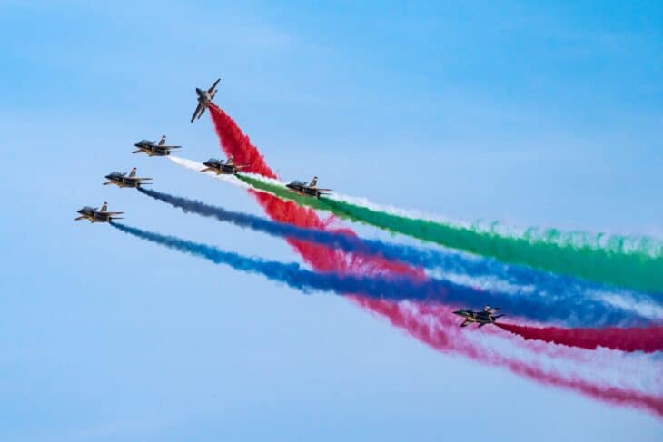 Al Fursan formation with red, green and blue smoke trails