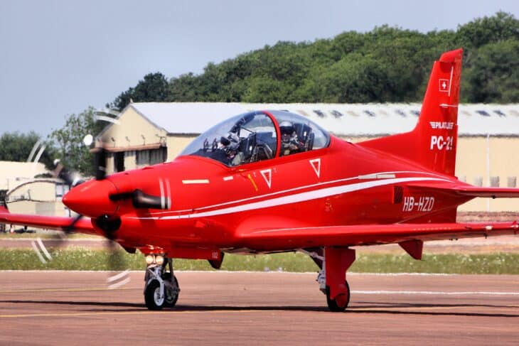 Pilatus PC-21 turboprop trainer in red Pilatus colours taxiing