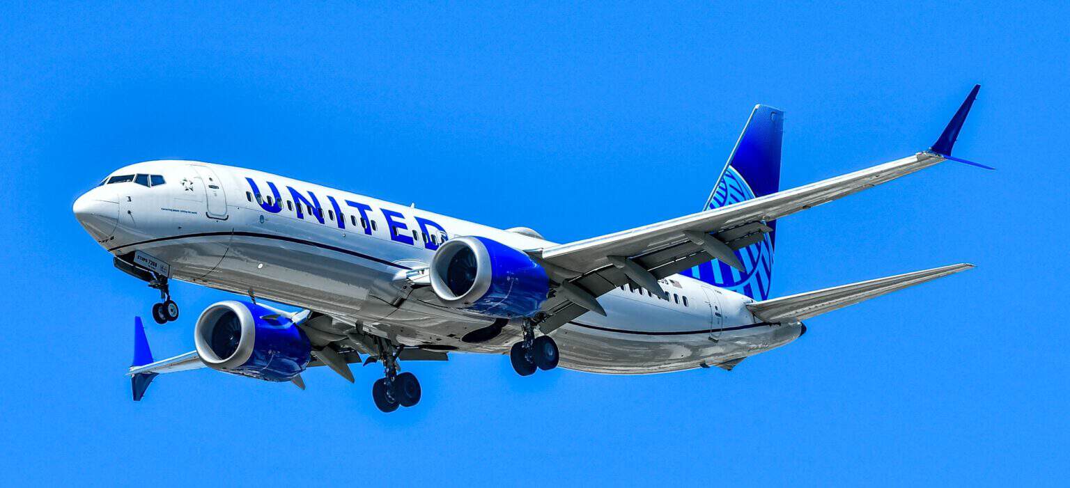 United Airlines Boeing 737 MAX 8 N77259 in flight with gear down on approach