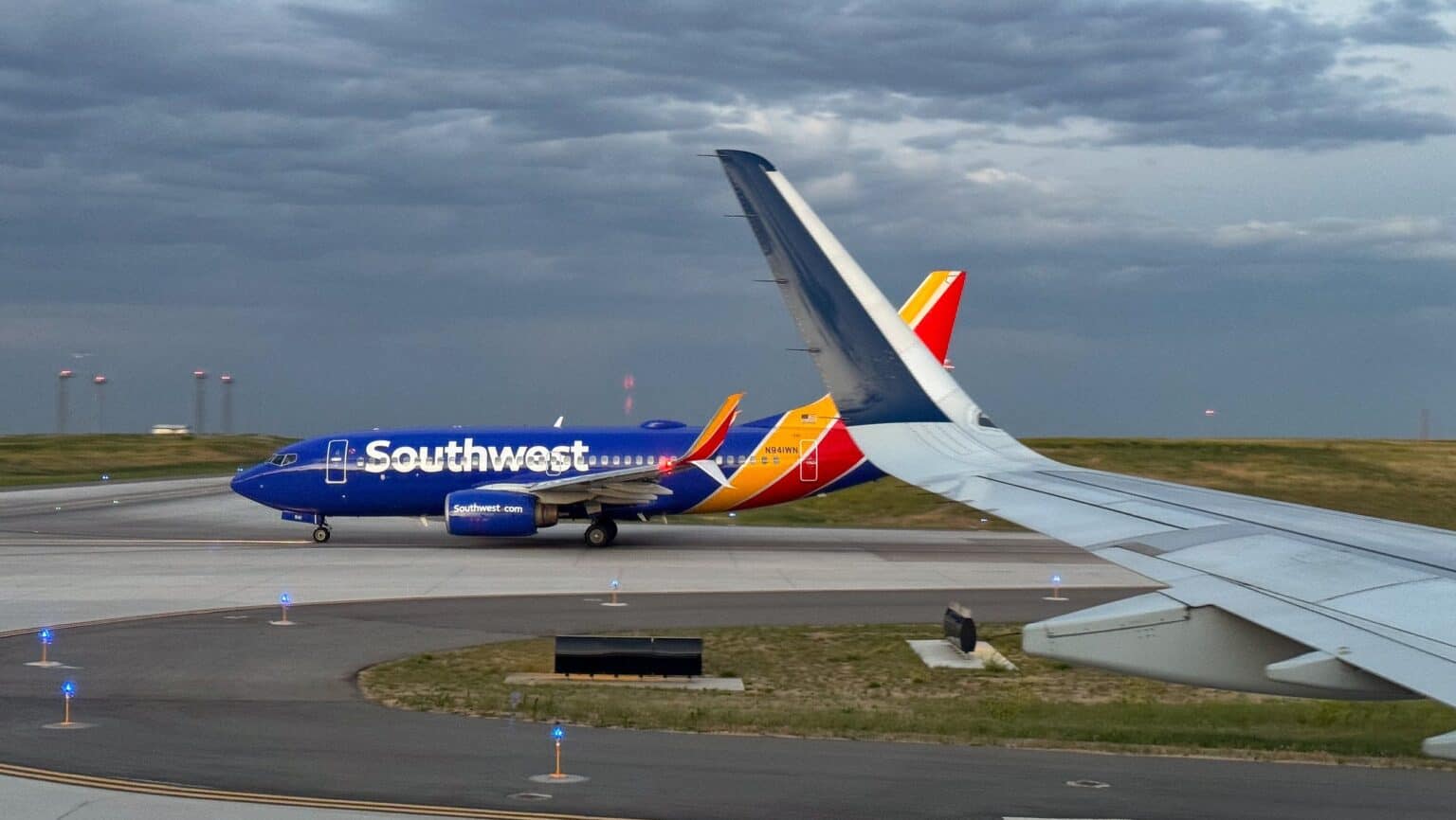Southwest Airlines Boeing 737 N941WN taxiing at Denver International Airport under a cloudy sky