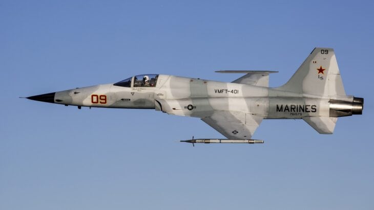 Marine Corps F-5N Tiger II of VMFT-401 taking off, with a red star on the tail