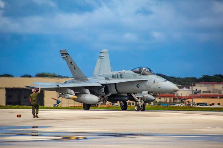 US Marine Corps F/A-18C Hornet of reserve squadron VMFA-112 taxiing on the flight line