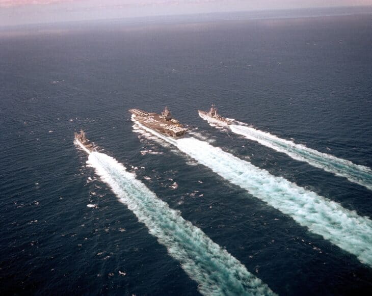Nuclear carrier Enterprise steaming between two nuclear cruisers on the Sea Orbit anniversary cruise