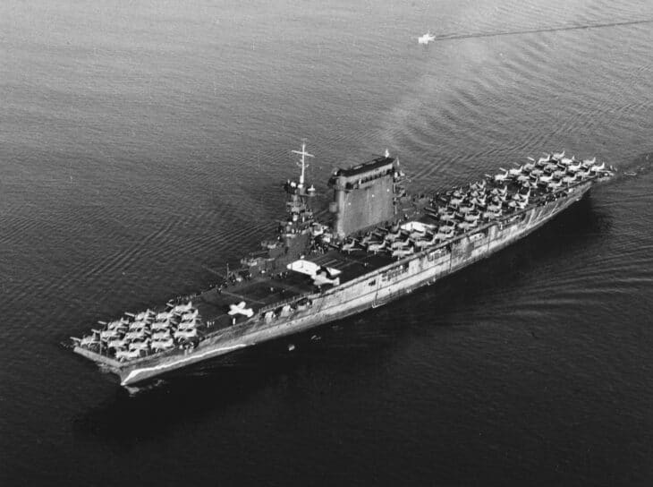 USS Lexington (CV-2) with aircraft parked on deck, leaving San Diego in October 1941