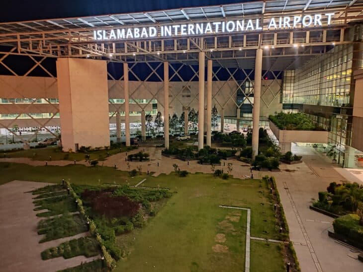 Islamabad International Airport terminal entrance with landscaped garden