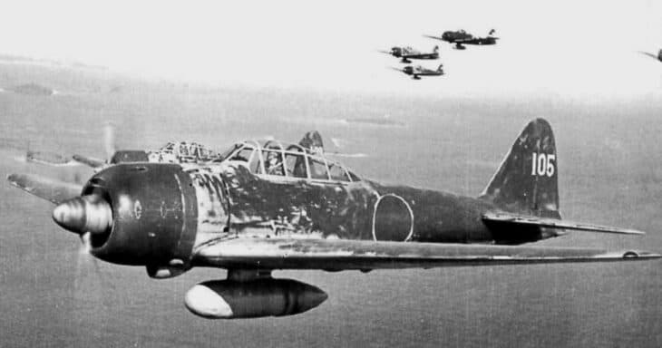 Mitsubishi A6M3 Model 22 Zero numbered UI-105 flying with a formation behind it