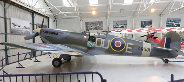 Supermarine Spitfire Vc AR501 in RAF markings inside a hangar