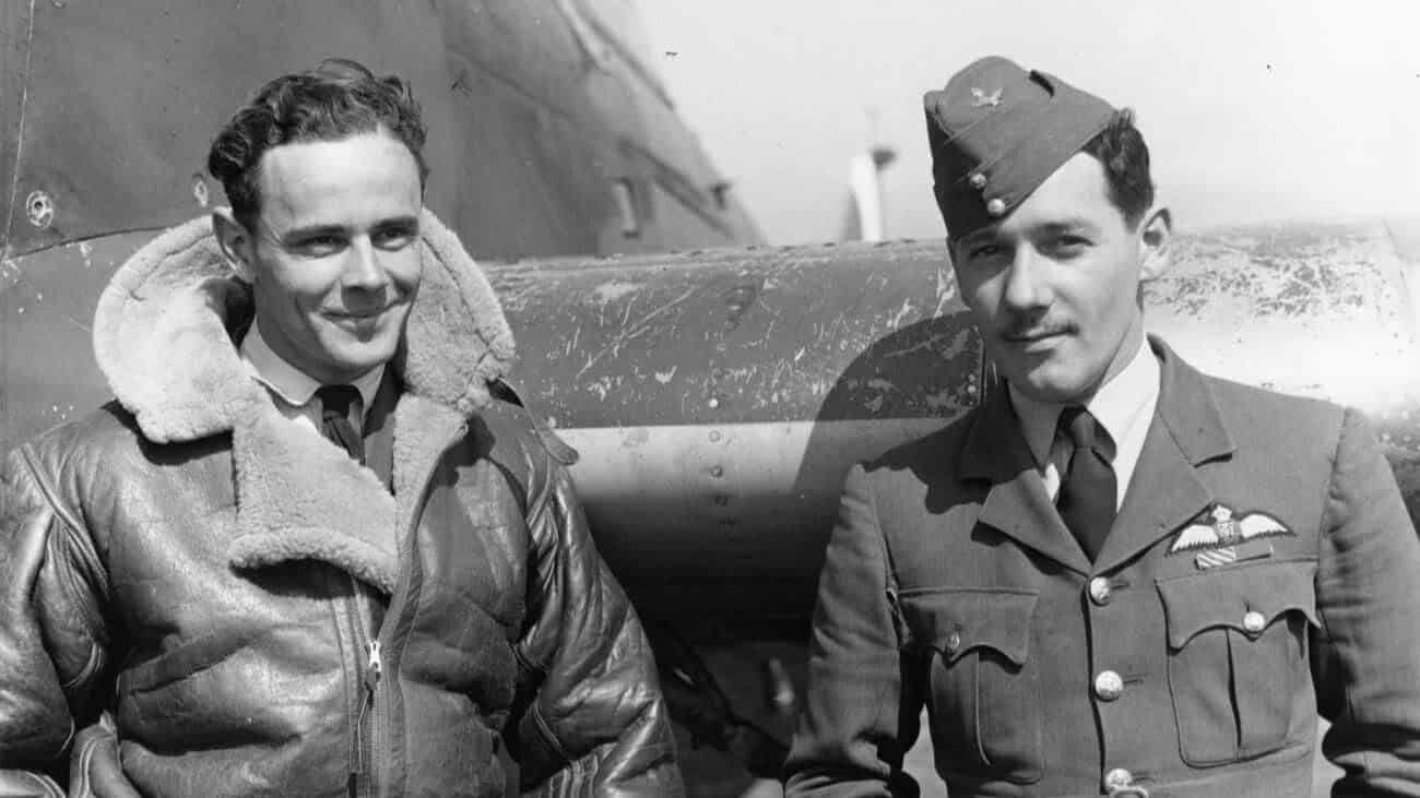 Squadron Leader Pat Pattle and another RAF pilot in flying gear in front of a fighter aircraft
