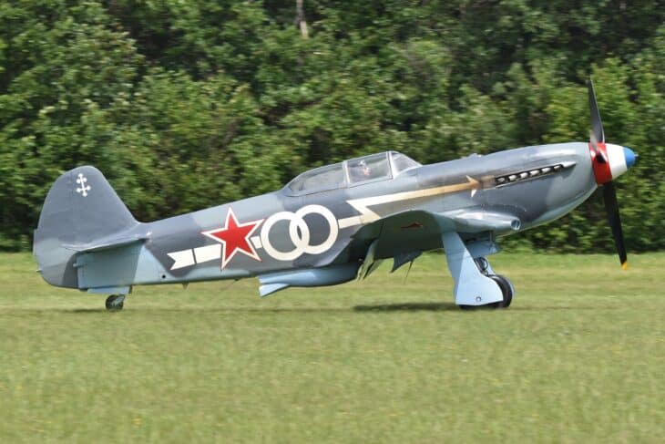 Yakovlev Yak-3 in Normandie-Niemen markings rolling across a grass airfield