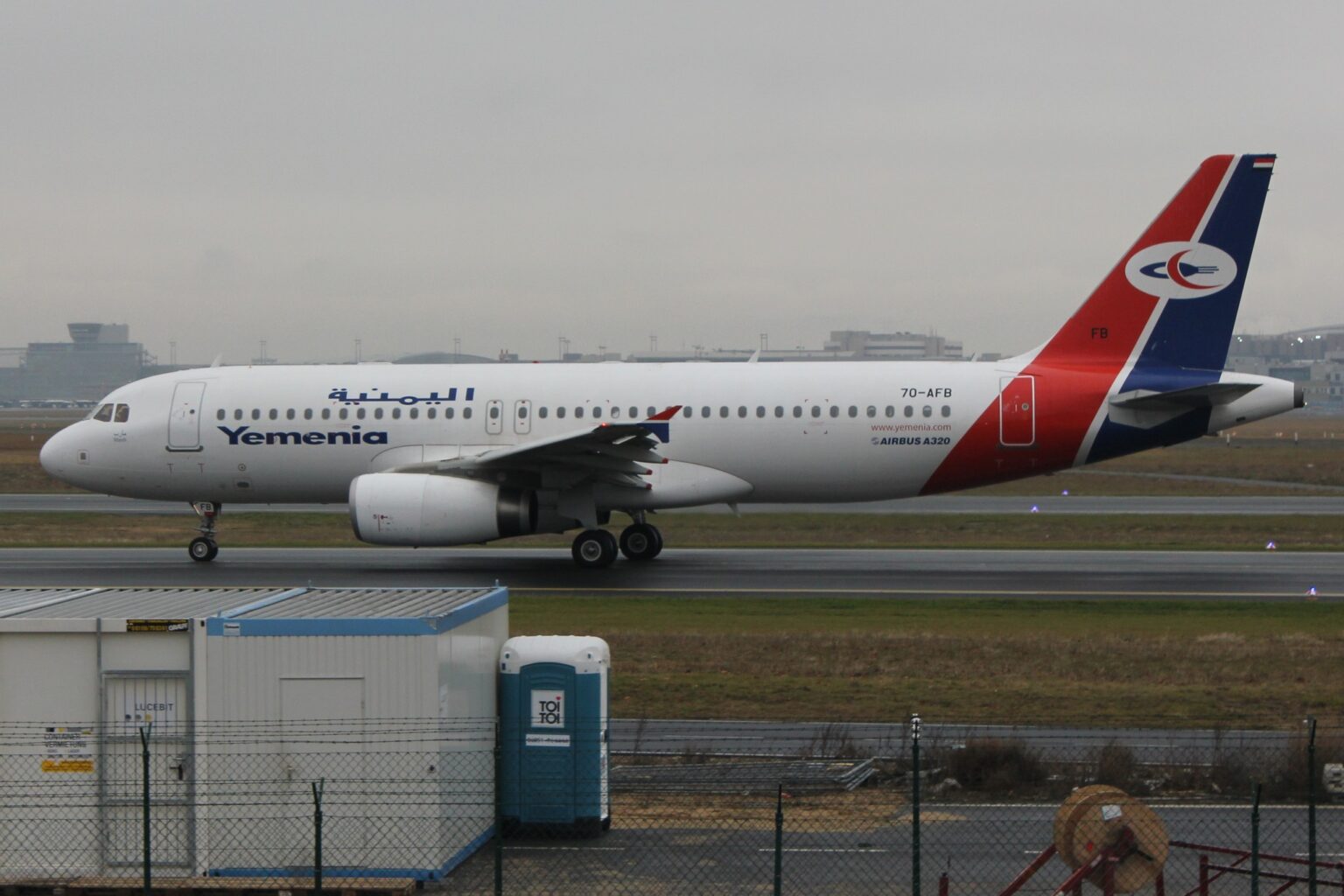 Yemenia Airbus A320 7O-AFB taxiing in the airline's red, blue and white livery